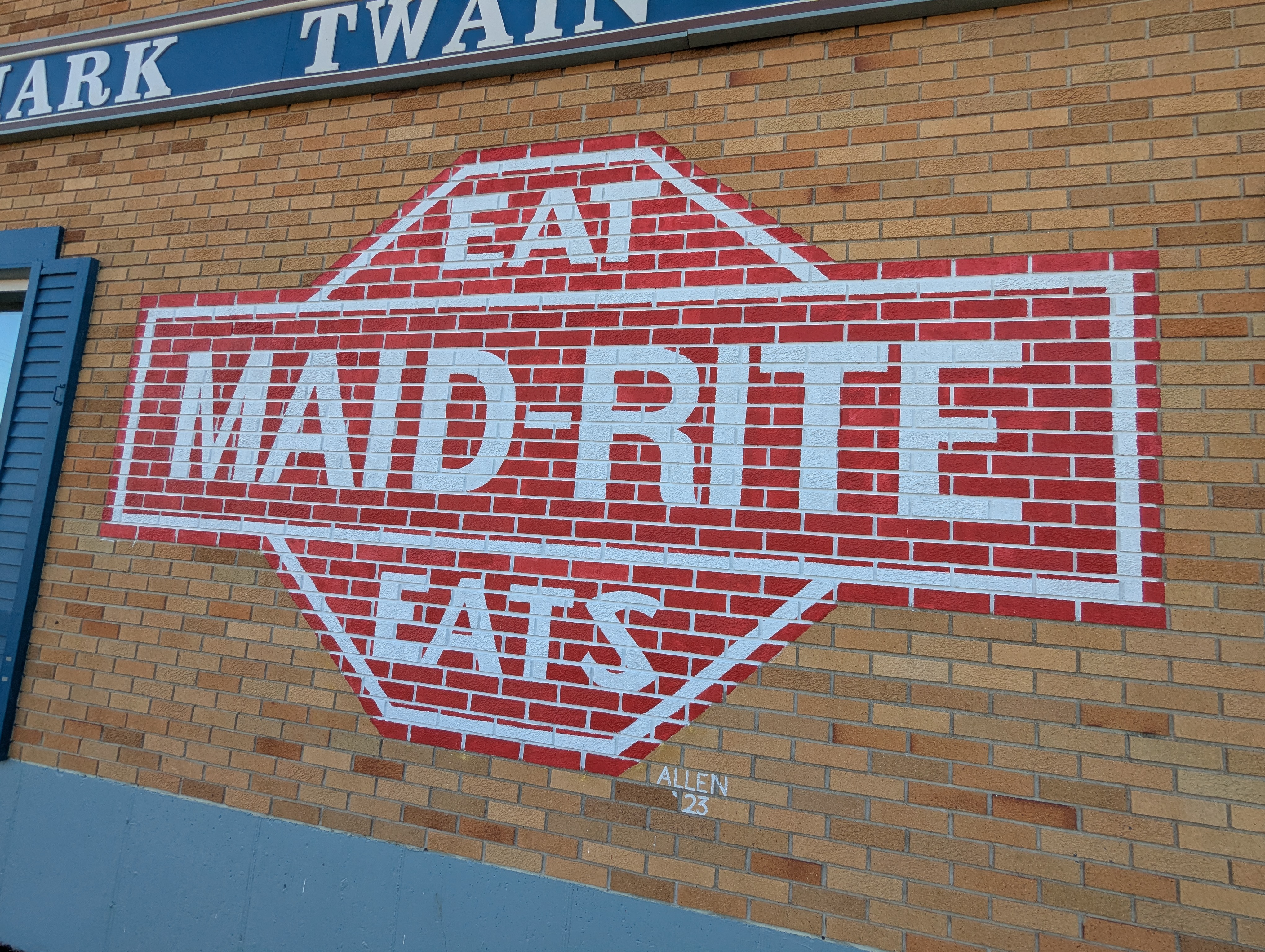 Muurprint Groningen binnenstad: logo op de muur voor horeca